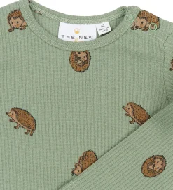 The New Siblings Body l/æ - Rib - TnsbRiver - Lily Pad AOP